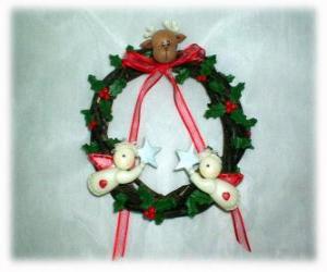 Puzzle Χριστούγεννα στεφάνι διακοσμημένο με φύλλα Χόλι κεφάλι ενός ταράνδου, δύο αγγέλους και ένα κόκκινο τόξο